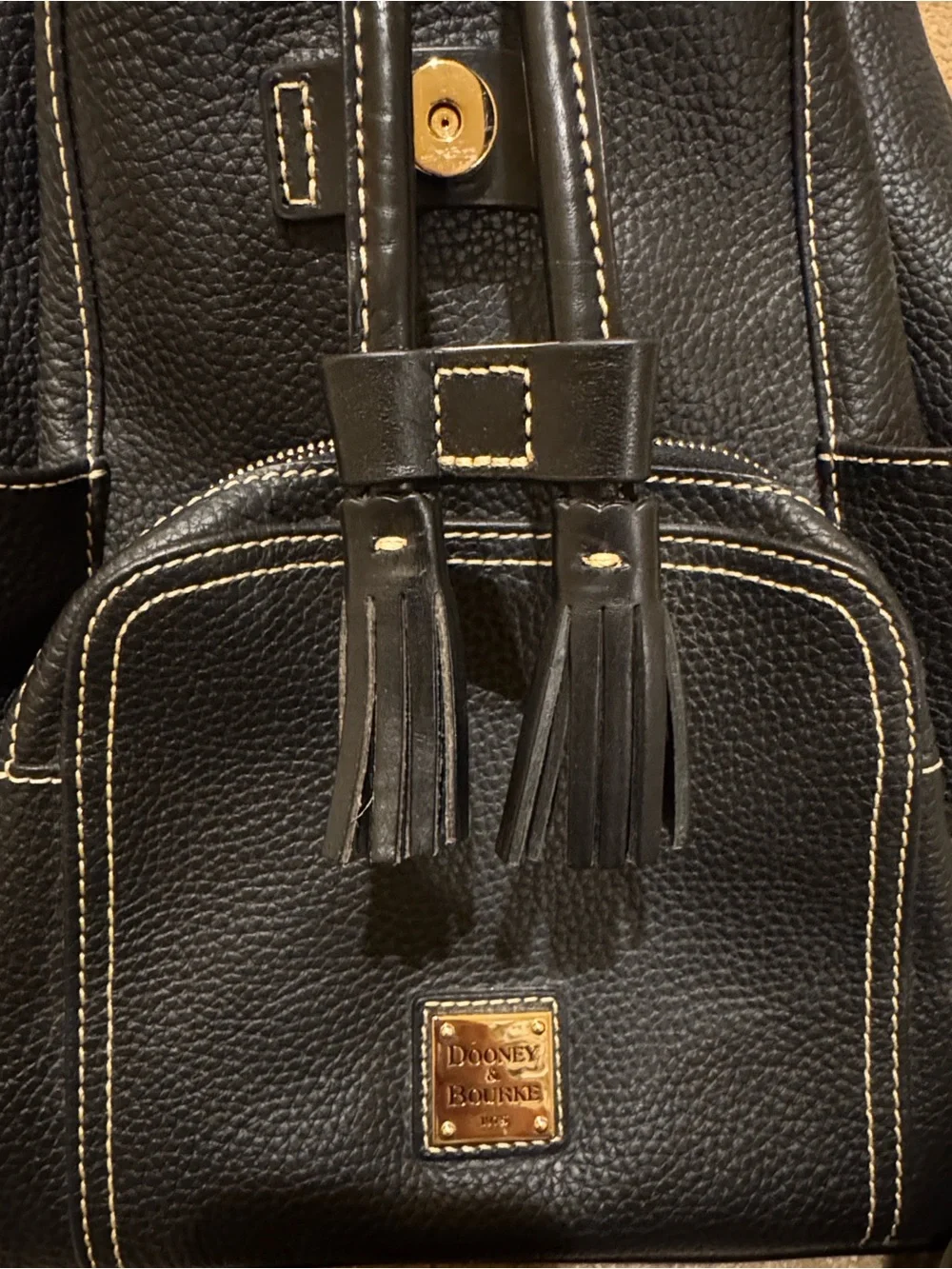 Black Leather Drawstring Backpack with Tassel Accent